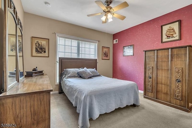 326 Biltmore Ln, Franklin Twp, NJ 08873 - carpeted bedroom featuring an accent wall, a ceiling fan, and baseboards