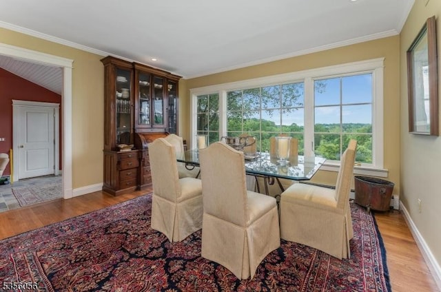 12 Woodland Rd, Franklin Twp, NJ 08867 - dining room with wood finished floors, ornamental molding, and baseboards