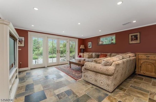 12 Woodland Rd, Franklin Twp, NJ 08867 - living room with crown molding, stone tile floors, french doors, recessed lighting, and baseboards