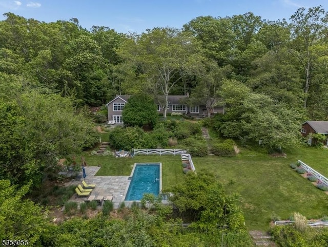 12 Woodland Rd, Franklin Twp, NJ 08867 - view of subject property featuring a pool area and a heavily wooded area