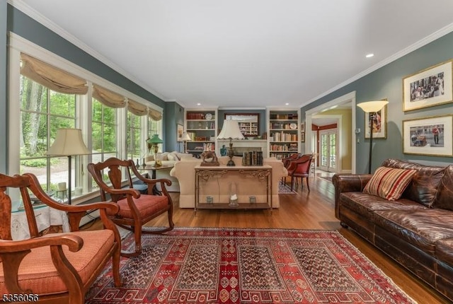 12 Woodland Rd, Franklin Twp, NJ 08867 - living area featuring wood finished floors, ornamental molding, built in features, and recessed lighting
