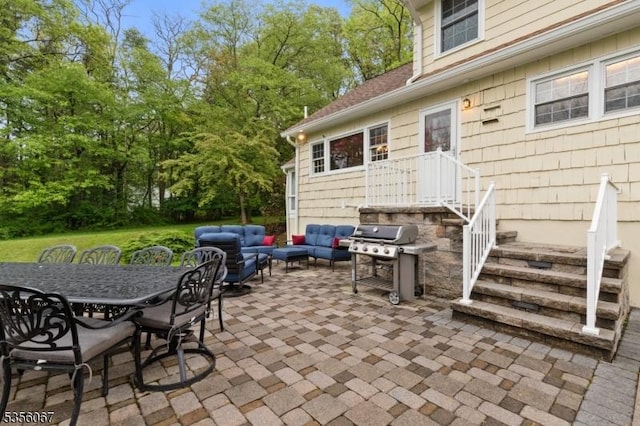 view of patio / terrace featuring an outdoor hangout area, area for grilling, and outdoor dining space