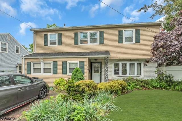 view of front of home with a front yard