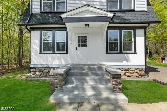 19 Oak Rd, Boonton Twp, NJ 07005 - view of front of property featuring roof with shingles and a front lawn