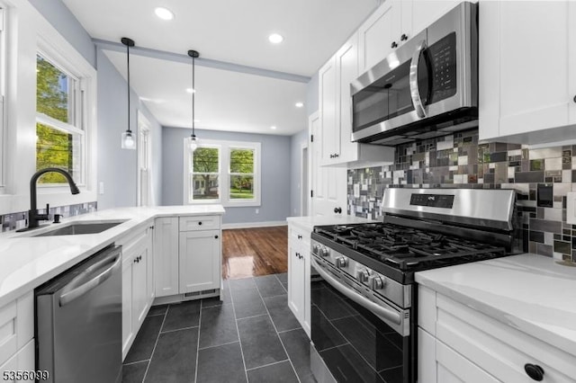 19 Oak Rd, Boonton Twp, NJ 07005 - kitchen with appliances with stainless steel finishes, a sink, white cabinetry, dark tile patterned floors, and recessed lighting