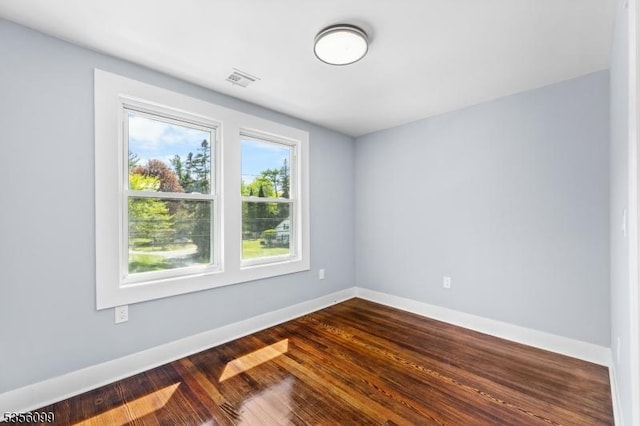 19 Oak Rd, Boonton Twp, NJ 07005 - unfurnished room with baseboards and dark wood-style flooring