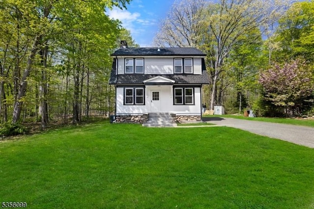 19 Oak Rd, Boonton Twp, NJ 07005 - view of front of house featuring a front lawn, a chimney, and a shingled roof