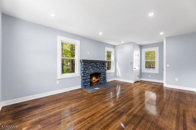 19 Oak Rd, Boonton Twp, NJ 07005 - unfurnished living room featuring a stone fireplace, wood finished floors, baseboards, and recessed lighting