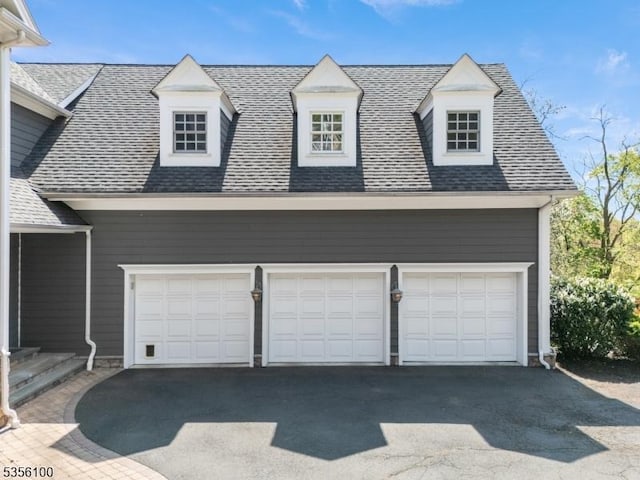 garage featuring driveway