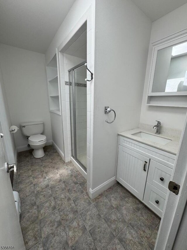 25 Ivy Pl, Vernon Twp, NJ 07418 - full bath with a stall shower, toilet, vanity, and baseboards