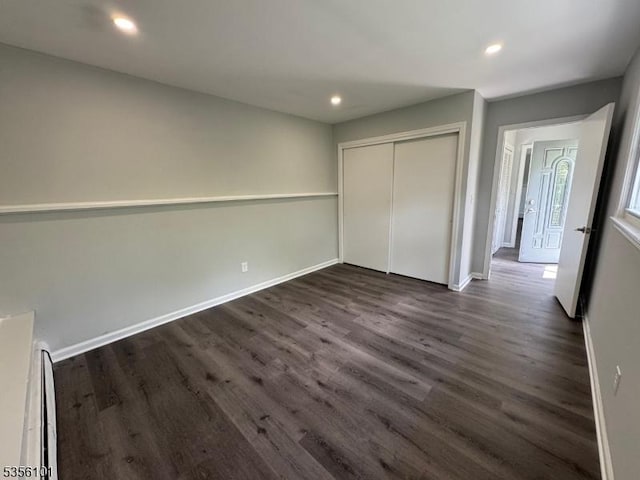 25 Ivy Pl, Vernon Twp, NJ 07418 - unfurnished bedroom with dark wood-type flooring, baseboards, recessed lighting, and a closet