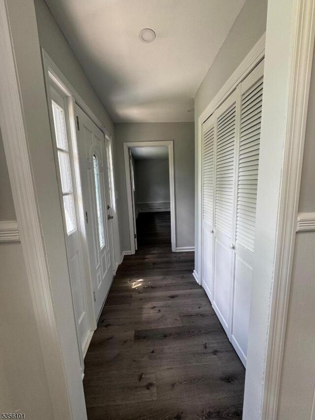 25 Ivy Pl, Vernon Twp, NJ 07418 - corridor featuring dark wood-style floors and baseboards
