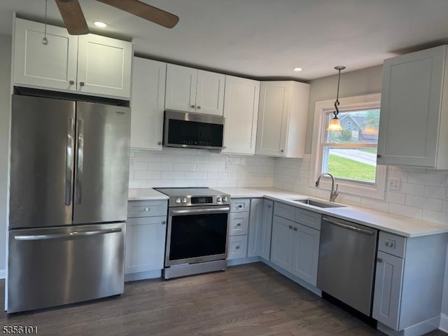 25 Ivy Pl, Vernon Twp, NJ 07418 - kitchen with stainless steel appliances, a sink, dark wood-style flooring, light countertops, and recessed lighting