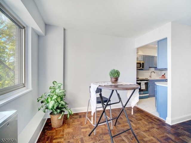 dining room with baseboards
