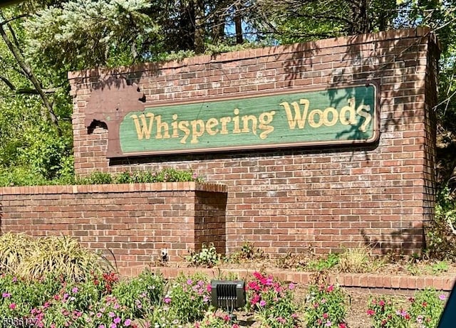 view of community sign