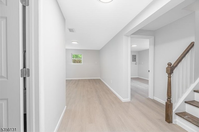 10 Maple Dr, Vernon Twp, NJ 07461 - corridor featuring wood finished floors, stairway, and baseboards