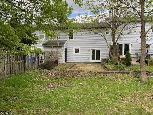 rear view of house with a chimney
