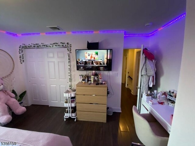 66 Lexington Ave, Rochelle Park Twp, NJ 07662 - bedroom with dark wood-type flooring