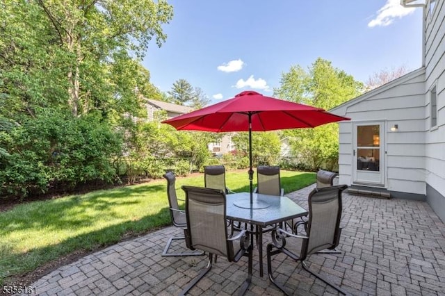 view of patio featuring outdoor dining area