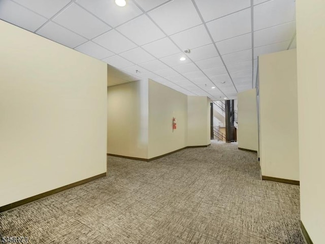 interior space with carpet floors, baseboards, and recessed lighting