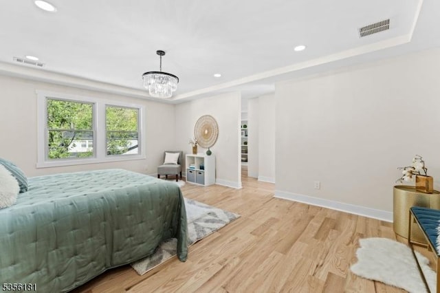 2227 Pine Ter, Scotch Plains Twp, NJ 07076 - bedroom featuring light wood-style floors, recessed lighting, a raised ceiling, a chandelier, and baseboards