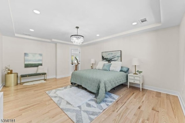 2227 Pine Ter, Scotch Plains Twp, NJ 07076 - bedroom with a tray ceiling, a chandelier, wood finished floors, baseboards, and recessed lighting