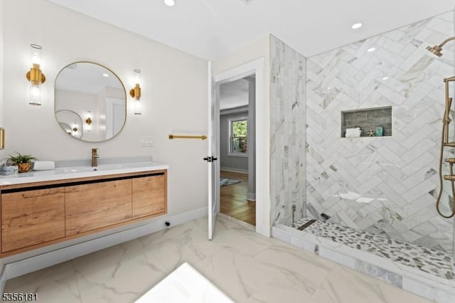 2227 Pine Ter, Scotch Plains Twp, NJ 07076 - bathroom with a stall shower, vanity, recessed lighting, marble look tiles, and baseboards