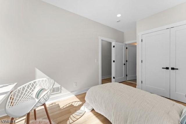 2227 Pine Ter, Scotch Plains Twp, NJ 07076 - bedroom with wood finished floors, baseboards, a closet, and recessed lighting