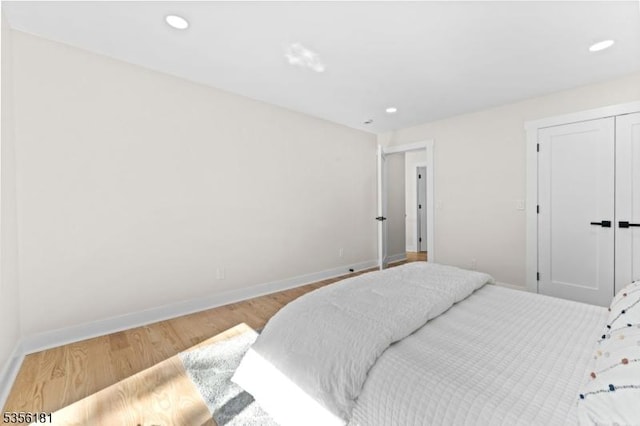 2227 Pine Ter, Scotch Plains Twp, NJ 07076 - bedroom with baseboards, recessed lighting, wood finished floors, and a closet