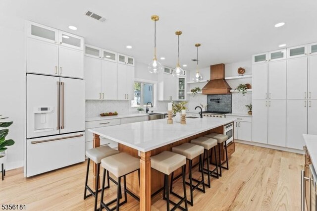 2227 Pine Ter, Scotch Plains Twp, NJ 07076 - kitchen featuring white appliances, light wood-type flooring, light countertops, and recessed lighting