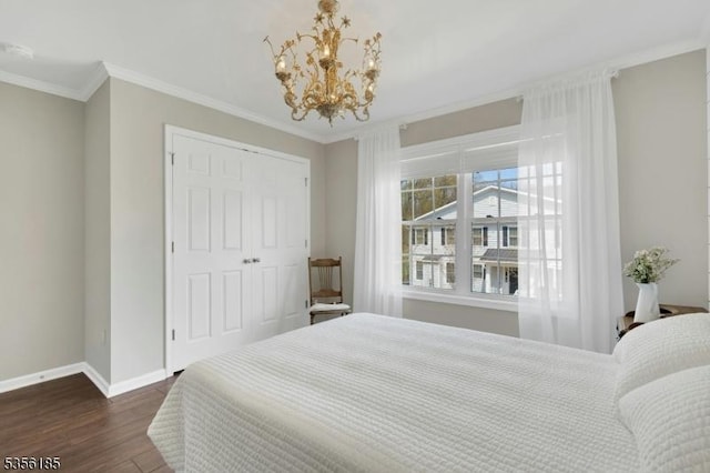 2 Lee Dr, Morris Twp, NJ 07960 - bedroom featuring dark wood-style flooring, baseboards, a chandelier, a closet, and crown molding