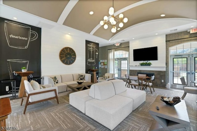 2 Lee Dr, Morris Twp, NJ 07960 - living area with recessed lighting, a chandelier, a glass covered fireplace, healthy amount of natural light, and lofted ceiling