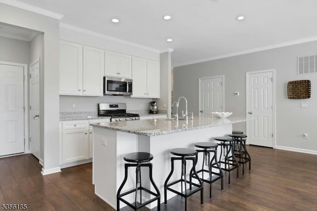 2 Lee Dr, Morris Twp, NJ 07960 - kitchen with appliances with stainless steel finishes, a sink, dark wood-style flooring, recessed lighting, and crown molding