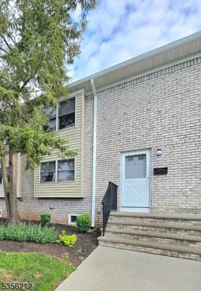 899 Robin Rd Unit 899, Hillsborough Twp, NJ 08844 - doorway to property with brick siding
