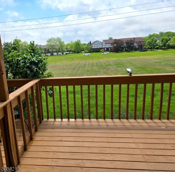 899 Robin Rd Unit 899, Hillsborough Twp, NJ 08844 - wooden deck featuring a lawn