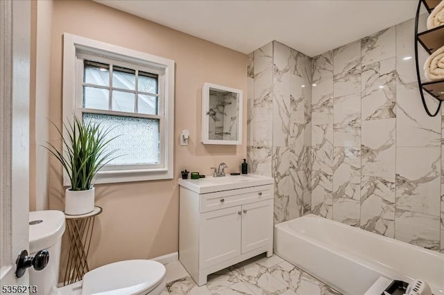 full bath with toilet, marble look tiles, vanity, tub / shower combination, and baseboards