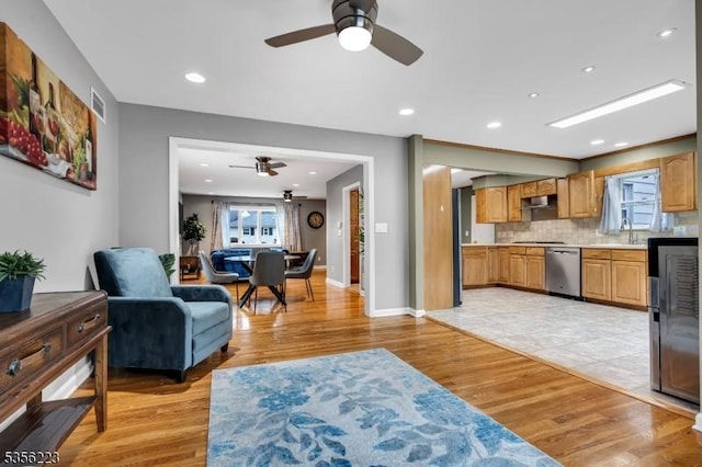 548 Birchwood Rd, Linden City, NJ 07036 - living room with a ceiling fan, light wood finished floors, and baseboards