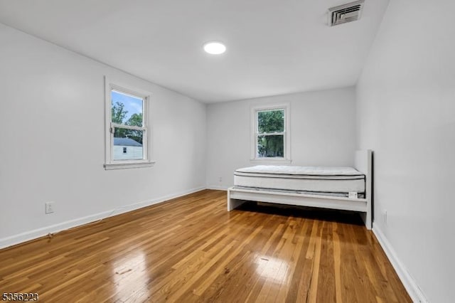 548 Birchwood Rd, Linden City, NJ 07036 - unfurnished bedroom featuring wood-type flooring and baseboards