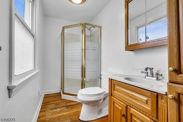 548 Birchwood Rd, Linden City, NJ 07036 - full bathroom featuring a shower stall, vanity, toilet, and wood finished floors