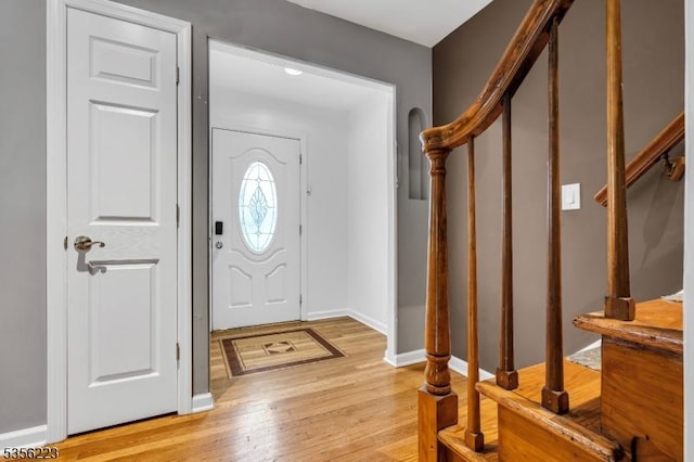 548 Birchwood Rd, Linden City, NJ 07036 - entrance foyer featuring light wood-style flooring, stairway, and baseboards