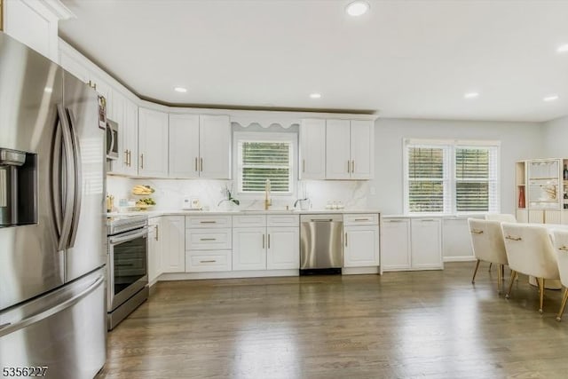 10 Longview Rd, Andover Twp, NJ 07860 - kitchen featuring appliances with stainless steel finishes, white cabinetry, light countertops, backsplash, and recessed lighting