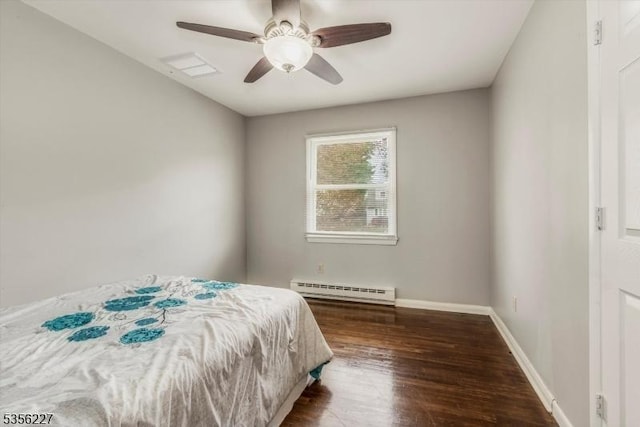 10 Longview Rd, Andover Twp, NJ 07860 - bedroom featuring baseboard heating, dark wood finished floors, baseboards, and ceiling fan