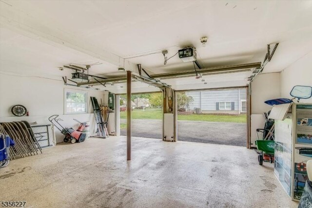 10 Longview Rd, Andover Twp, NJ 07860 - garage with a garage door opener and electric panel