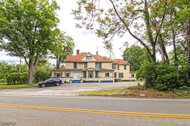 111 Decker Pond Rd, Green Twp, NJ 07821 - view of front of property featuring uncovered parking and a chimney