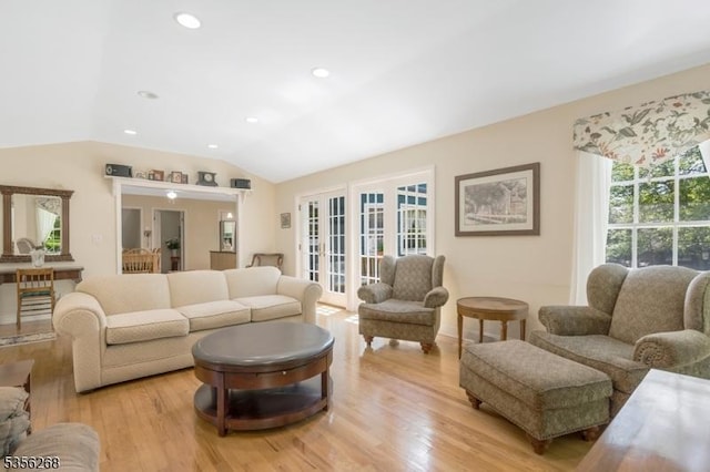 1341 Crim Rd, Bridgewater Twp, NJ 08807 - living area with french doors, light wood finished floors, lofted ceiling, and recessed lighting