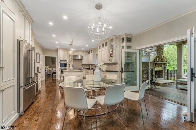 30 Southgate Dr, Clinton Twp, NJ 08801 - dining area with a chandelier, ornamental molding, dark wood finished floors, and recessed lighting