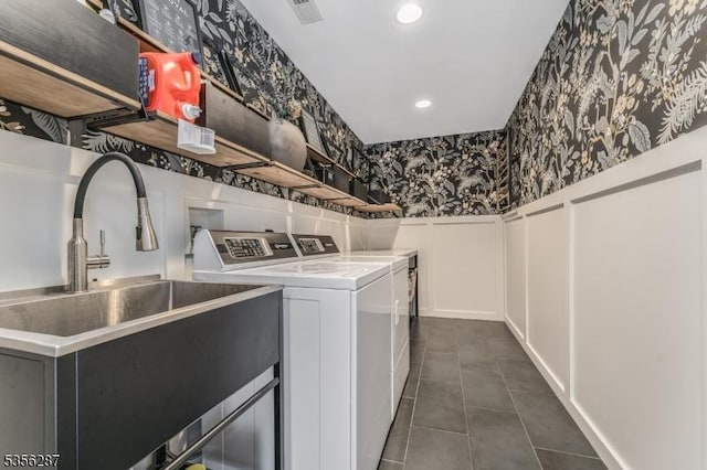 30 Southgate Dr, Clinton Twp, NJ 08801 - clothes washing area with wallpapered walls, washer and dryer, dark tile patterned floors, a wainscoted wall, and recessed lighting