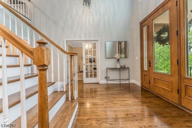 30 Southgate Dr, Clinton Twp, NJ 08801 - entrance foyer featuring a high ceiling, stairway, wood finished floors, french doors, and baseboards