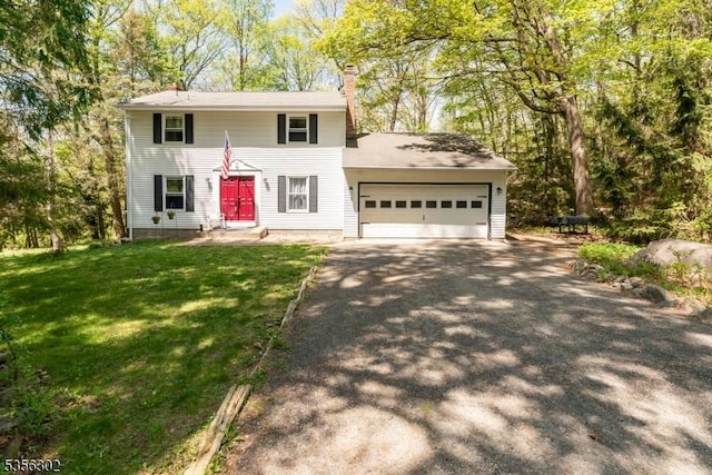 6 Longview Ln, Vernon Twp, NJ 07461 - colonial home with asphalt driveway, a chimney, a garage, and a front yard