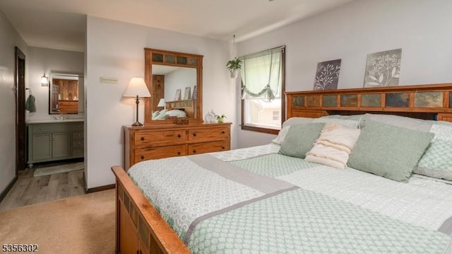 6 Longview Ln, Vernon Twp, NJ 07461 - bedroom with ensuite bath, light colored carpet, and baseboards